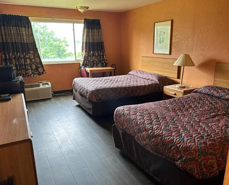 Two-bed guest room at Hillcrest Motel